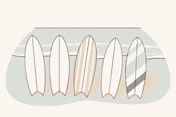 Collection of surfboards in various designs against a neutral background  