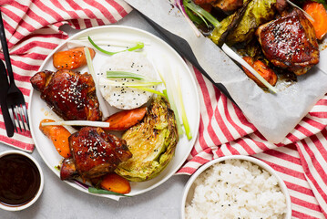 Five Spice Chicken Sheet Pan with teriyaki  sauce, vegetables and rice.selective focus