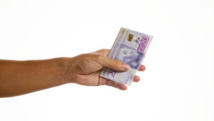 Man holding swedish kronor over isolated white background implying financial concept