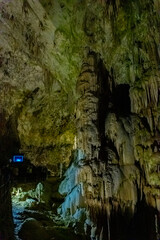 Exploring beautiful Postojna cave in Slovenia the most visited european cave.  Thousands of stalagmites and stalactites