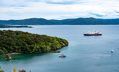 Harbour stewart island new zealand with cruise ship in the water
