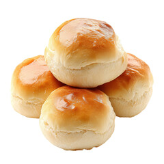Freshly baked rolls stacked on a wooden surface in a warm kitchen setting