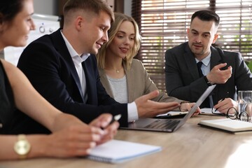 Marketing. Team of businesspeople working together at desk in office