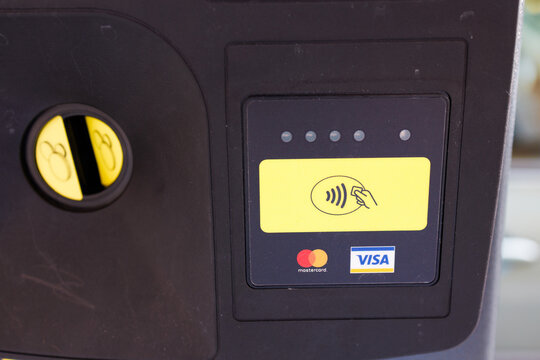 Warsaw/Poland - June 5, 2025: Credit card reader on public terminal with Mastercard and Visa logos