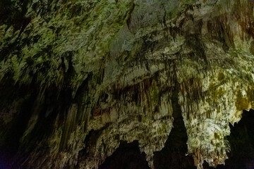 Exploring beautiful Postojna cave in Slovenia the most visited european cave.  Thousands of stalagmites and stalactites