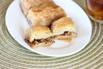 sweet baklava in a plate on the table