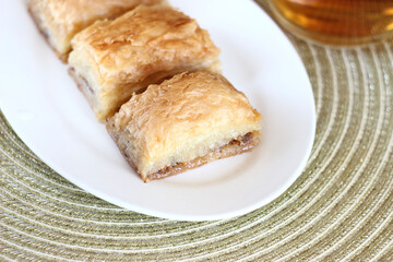 sweet baklava in a plate on the table