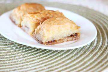 sweet baklava in a plate on the table