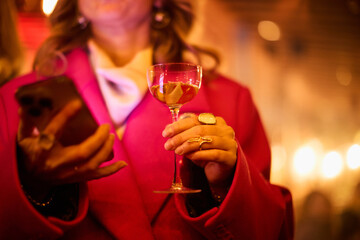 Elegant Woman Holding Wine Glass 