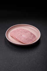 Sliced ham, meat or pork sausage for sandwiches. Cooked smoked prosciutto, ham