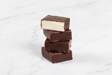 Bird's milk. Delicate dessert. Vanilla souffle in chocolate glaze