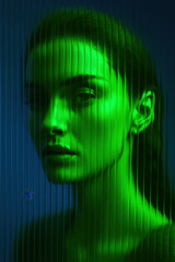 Obraz premium Conceptual Portrait Through Textured Glass with Green Lighting