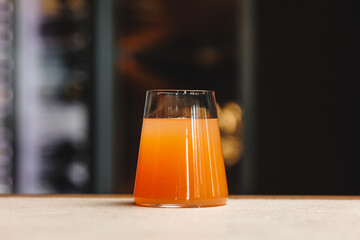 Freshly squeezed orange juice in a stylish glass