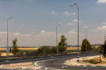 A Rural Road With A Sign For Shuva.