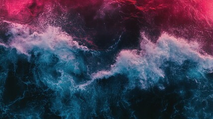 Fototapeta premium A dramatic aerial view of powerful ocean waves crashing