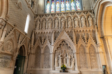This striking photograph captures the grandeur of St. Colman's Cathedral in Cobh, Ireland—a...