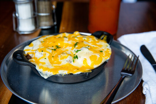 Pizza dough balls covered with cheese	