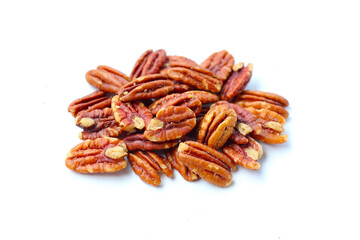 Delicious salted pecan nuts scattered.