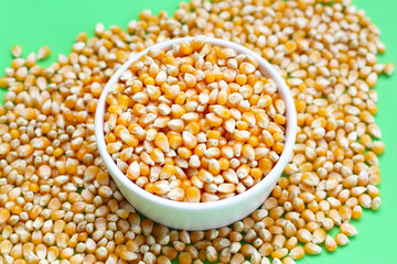Yellow raw unpopped popcorn kernels