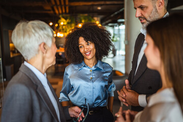 professional business team during a meeting, focus on a smiling woman