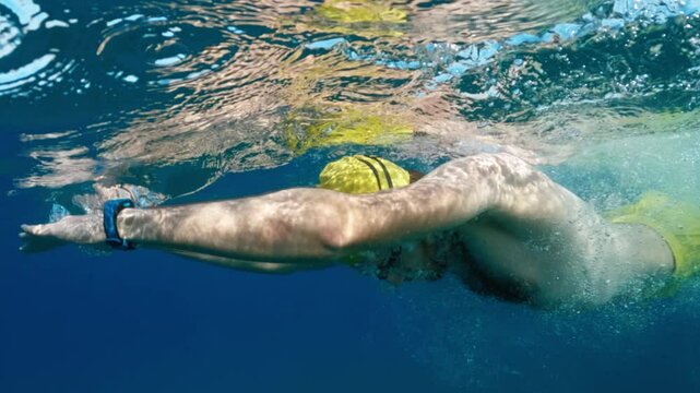 Athlete Training The Respiration During A Swim In Breaststroke In The Ocean 