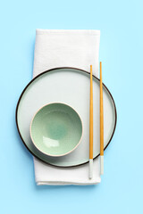 Chinese table setting on light blue background
