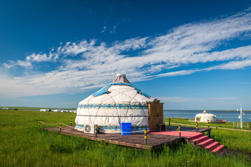 The Mongolian yurts on the Horonor Grassland in Hulunbuir City, Inner Mongolia Autonomous Region, China