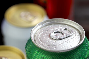 Cold canned beer ready to drink in the fridge