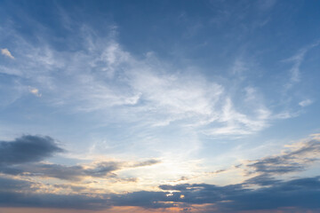 Beautiful morning or evening blue and orange sky with cloudy while sunsets or sunrises taken at the sea used as natural background texture