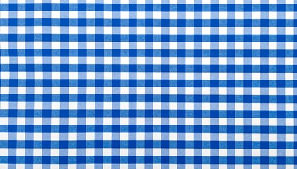 Blue and white checkered tablecloth texture. Blue picnic cloth pattern wallpaper background.Kitchen menu backdrop.Retro fabric surface 