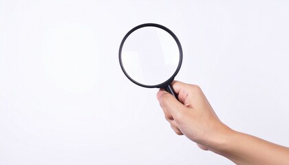 Close-up of a woman holding a magnifying glass, isolated on white background, search and investigation concept.