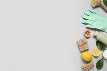 Composition with natural products and supplies for cleaning on grey background