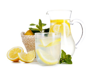 Jug and glass of fresh lemonade isolated on white background
