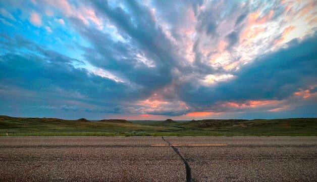 A pastel dusk over a solitary Montana highway