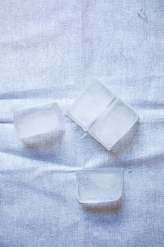 close up of ice on a table cloth