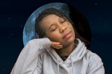 Sleeping African Woman in Hoodie with Moon Background at Night