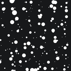 This abstract image displays a dark background filled with randomly scattered white circles of various sizes.