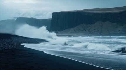 Coastal waves crashing onto a black sand beach landscape