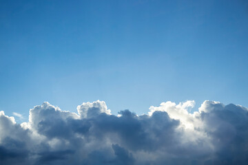 blue sky with fluffy clouds