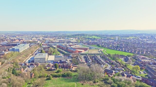 Aerial view of Wakefield city, West Yorkshire, England, showcasing the HM Prison Wakefield, known as &lsquo;Monster Mansion,&rsquo; surrounded by the suburban landscape.