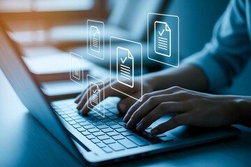 Person using laptop computer with digital document icons appearing above keyboard, signifying online document management and workflow.