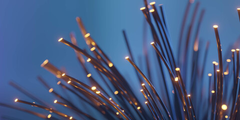 Glowing Fiber Optic Strands on Blue Background