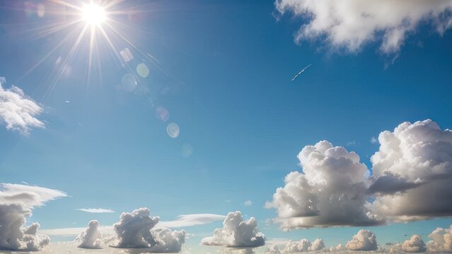 Bright sky with cumulus clouds and sunlight.