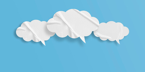 White speech bubble crumpled paper isolated on light blue background