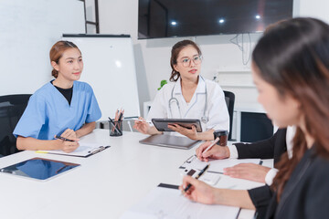 Group of doctors and business people meeting at the hospital