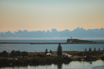 View of Nobby's Beach lighthouse from Stockton Bridge in Newcastle