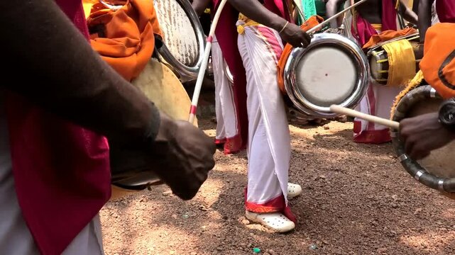 Artists playing Thavil, a South Indian percussion musical instrument