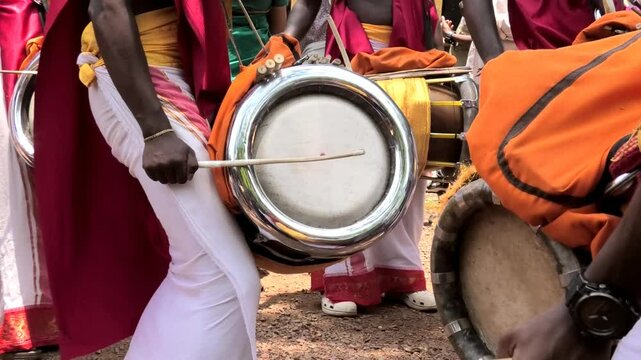 Artists playing Thavil, a South Indian percussion musical instrument