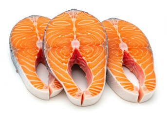 Three fresh raw salmon steaks isolated on white background