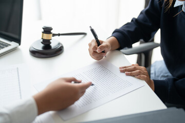 Lawyer businessman working with lawbook in office or courtroom Legal counsel with gavel and legal...